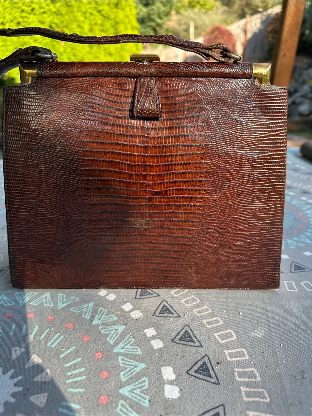 Women’s lizard skin mid century bag